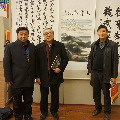 中宣部院秘書長(zhǎng) 王偉華（中）